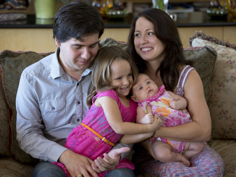 In this 2014 file photo, award-winning concert pianist Vadym Kholodenko, poses with his wife Sofya Tsygankova and daughters Nika, 4, and Michela, at their home in Fort Worth, Texas.