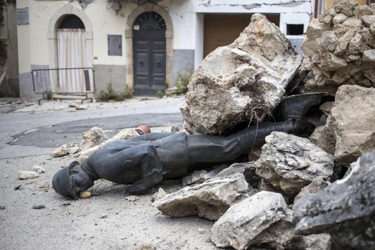 Image: Aftershocks continue in quake-ravaged central Italy