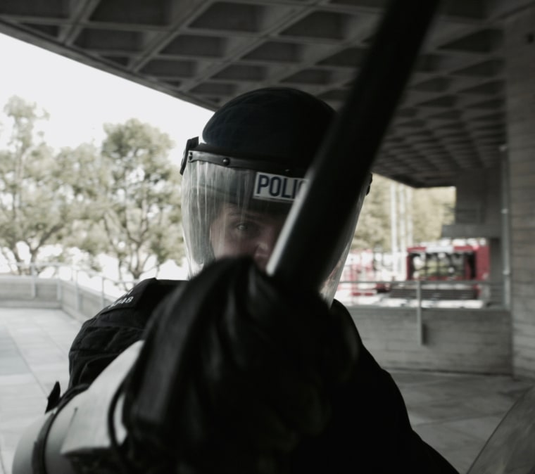 Image: A still from the movie "RIOT", which individual users stand in front of to watch as their emotions are read