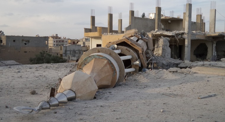 Image: A 2014 file photo of a minaret destroyed in air strikes by Syrian army  warplanes in Raqqa, Syria.