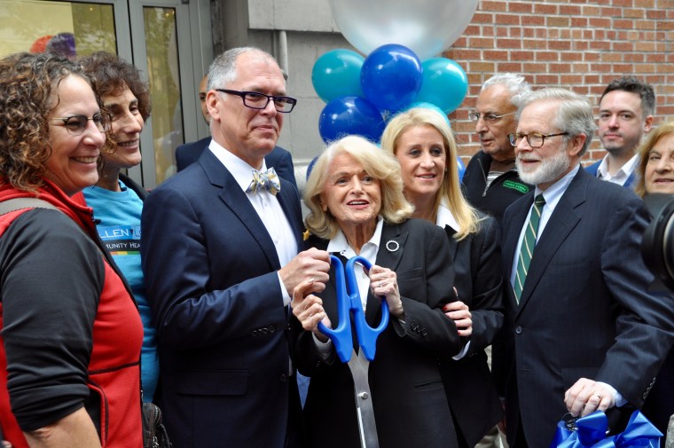 United States v. Windsor plaintiff Edie Windsor and Obergefell v. Hodges plaintiff Jim Obergefell holding the scissor used to cut the ribbon of the Thea Spyer Center in New York City on Nov. 3, 2016.