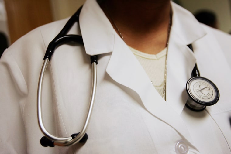 Image: A physician assistant wears a stethoscope