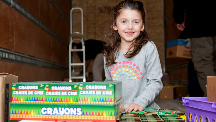 Little girl who collects boxed crayons for children's hospitals.