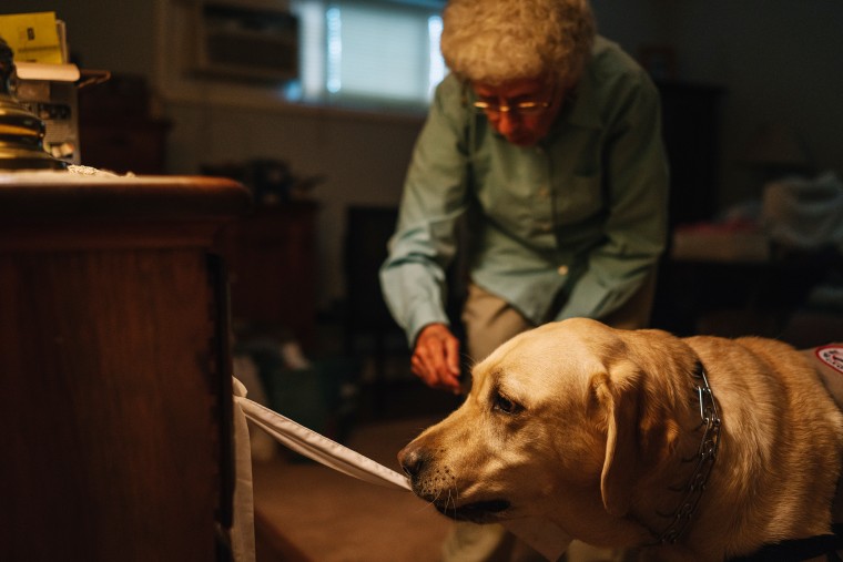 Annabelle Weiss and her service dog Joe in Lindenhurst, New York.