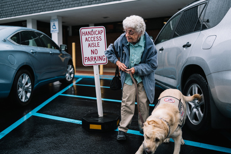 Annabelle Weiss and her service dog Joe in Lindenhurst, New York.