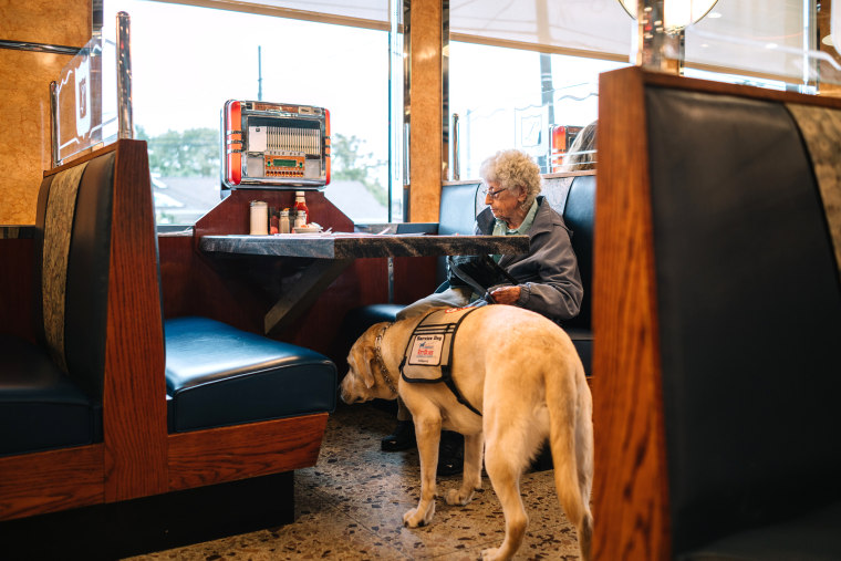 Annabelle Weiss and her service dog Joe in Lindenhurst, New York.