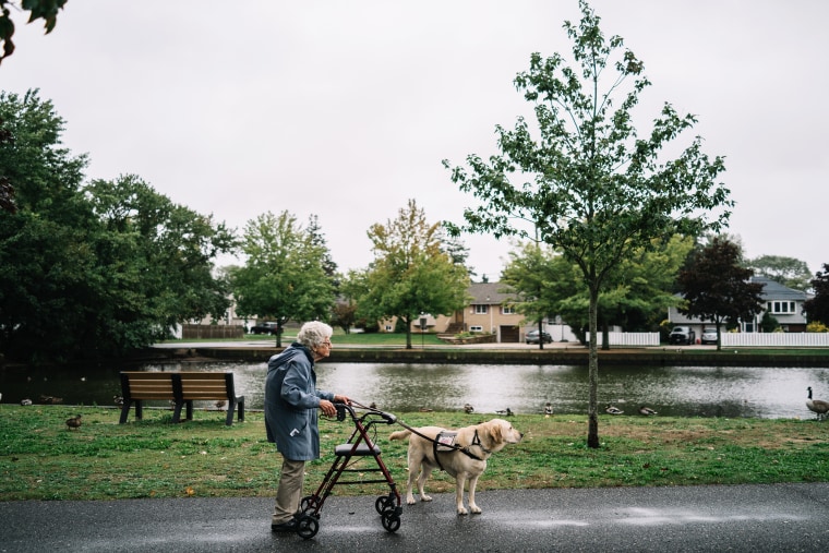 Annabelle Weiss and her service dog Joe in Lindenhurst, New York.