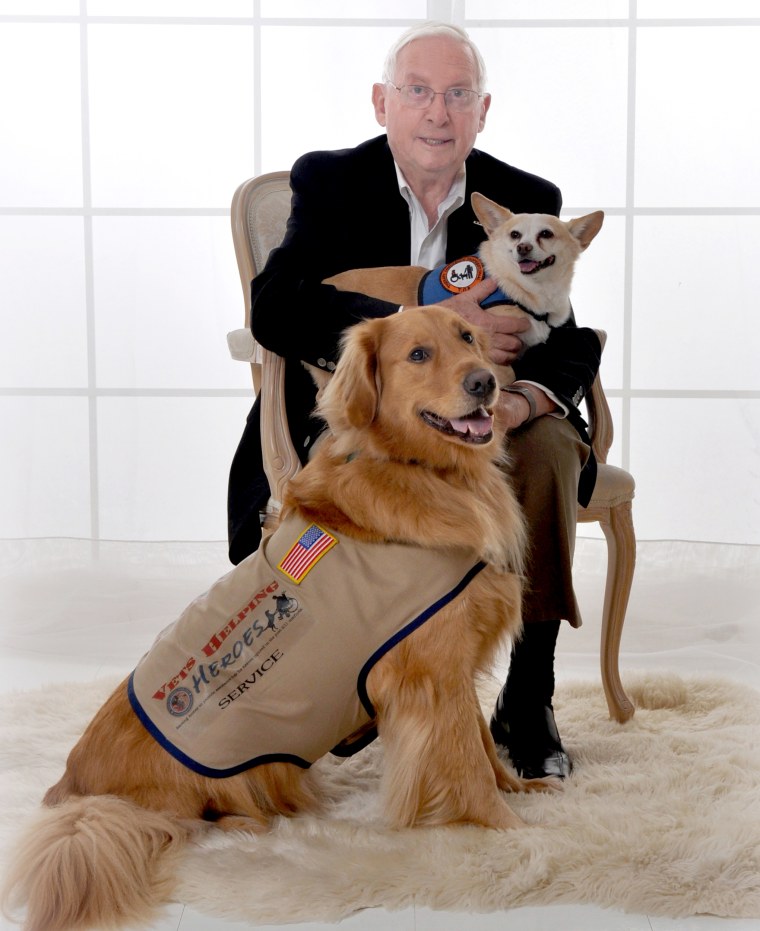 Irwin Stovroff with his service dogs Cash and Jenny.