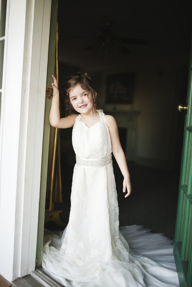 4 year old Nora Davis wears mother s wedding dress in shoot