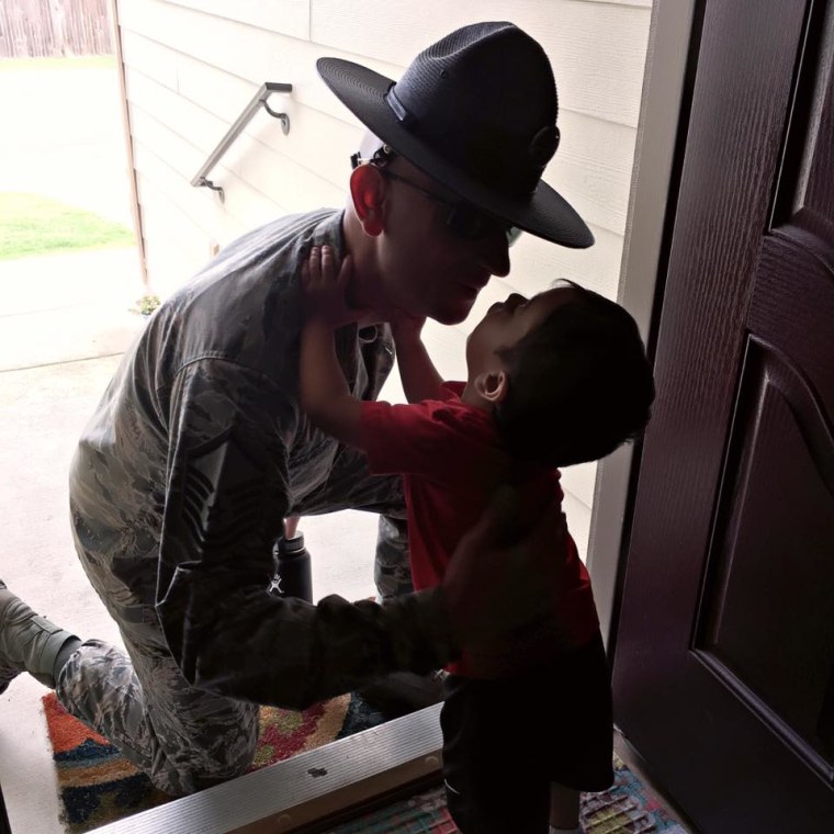 United States Air Force Master Sergeant Reymundo Marquez III saying bye to his 3-year-old son Leo. 