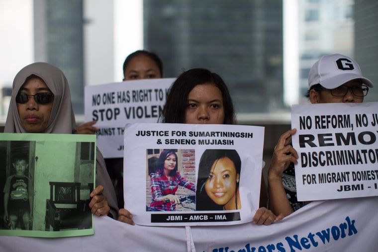 Image: A rally n support of murdered women Sumarti Ningsih and Seneng Mujiasih