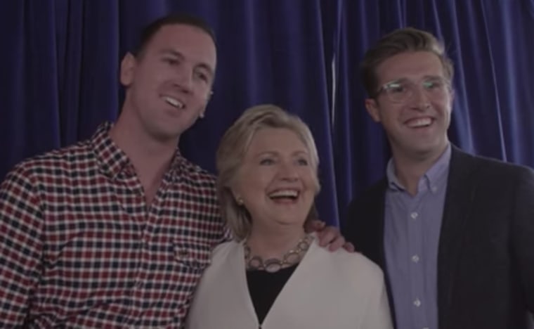 (L-R) Kyle Rush, Hillary Clinton and Greg Goodwin shortly after Goodwin proposed to Rush, who works on the Clinton Campaign