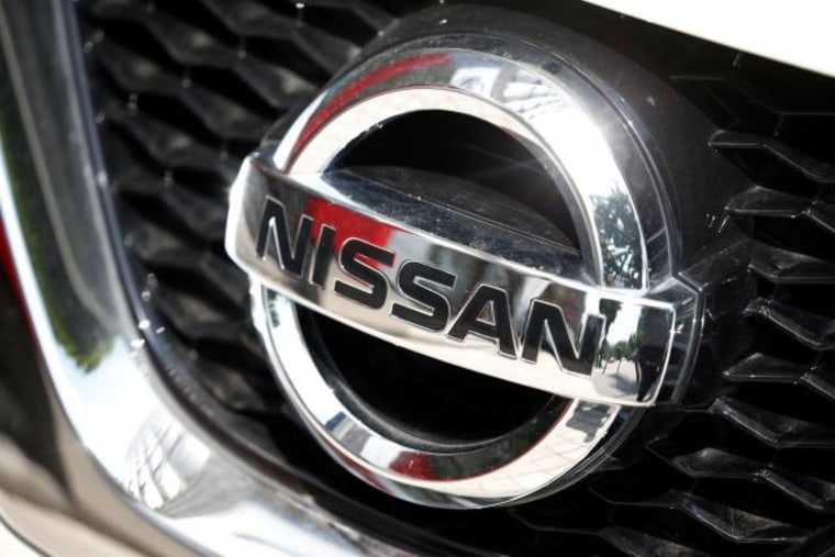The logo of Nissan is seen on a Qashqai car at its dealership in Seoul