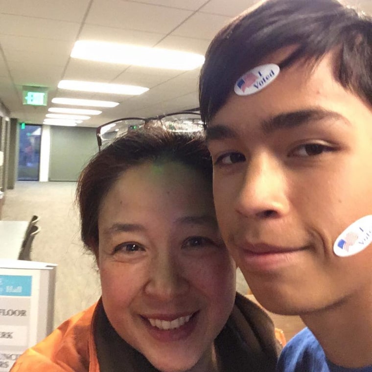 Frances Kai-Hwa Wang and her son at City Hall after casting her ballot on Election Day.