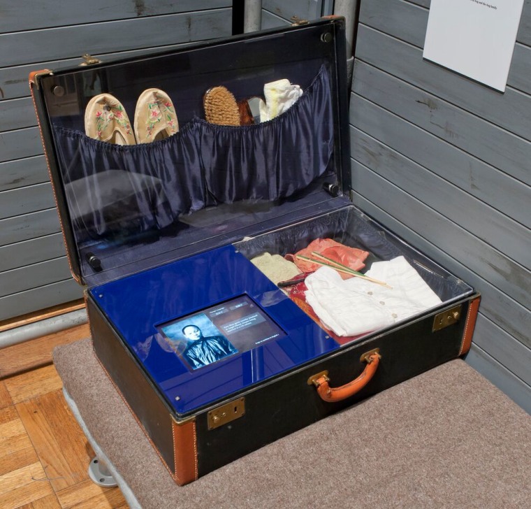 A suitcase on display in "Chinese American: Inclusion/Exclusion"