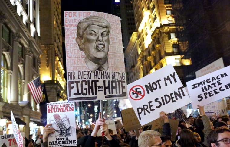 Image: A crowd marches from Union Square to Trump Tower