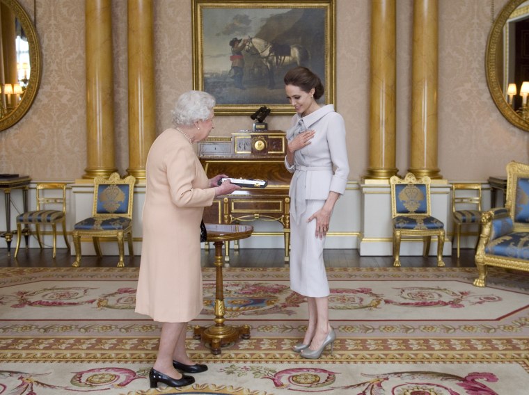 Queen Elizabeth inside Buckingham Palace