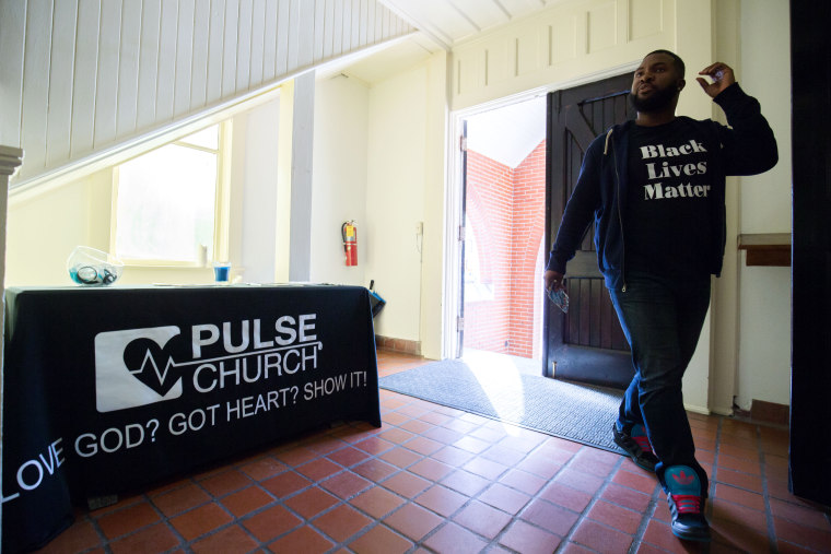 D'Andre Mayberry enters Pulse church before a church service