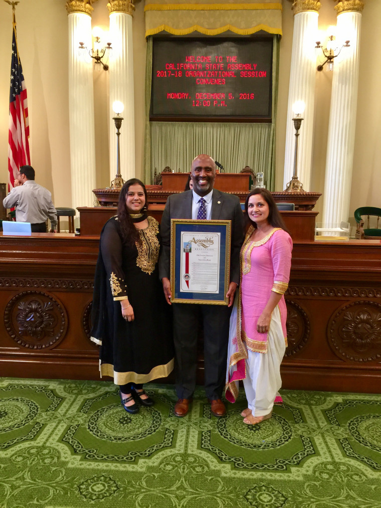 Harjit Kaur, Assemblymember Jim Cooper, and Goldy Shergill with the resolution declaring November Sikh Awareness and Appreciation Month.