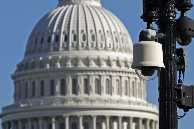 Image: Surveillance cameras are visible near the U.S.Capitol