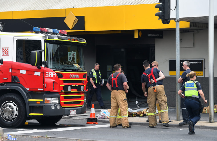 Image: Emergency crews after fire at a bank in Melbourne, Australia