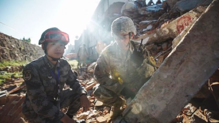 Image: A U.S. soldier and a member of the Chinese People's Liberation Army