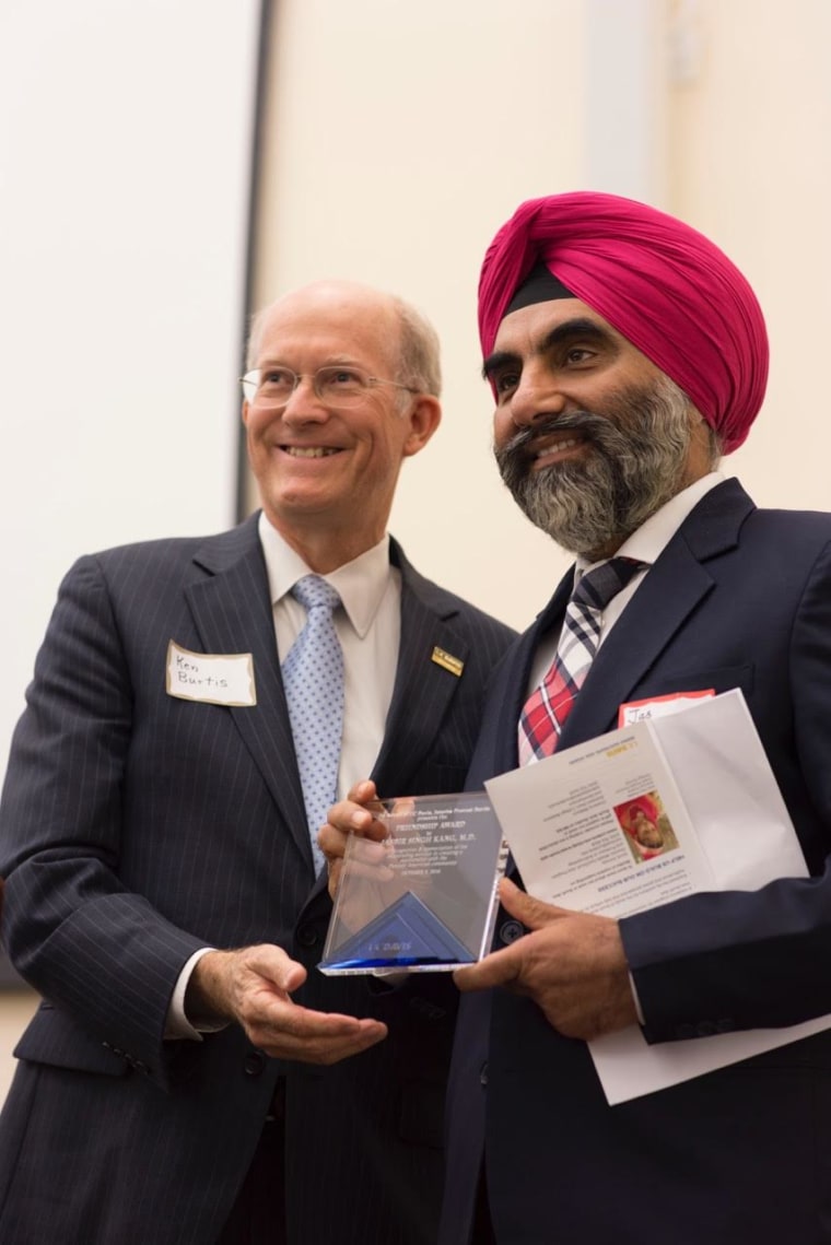 UC Davis Provost Kenneth Burtis presents Dr. Jasbir Singh Kang with an award honoring his work for the Punjabi American community at a launch event on October 8 for the Pioneering Punjabis Digital Archive.