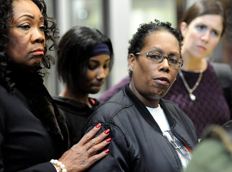 Image: Wilson, cousin of Castile talks with reporters after Minnesota police officer Yanez made his first court appearance after being charged in connection with the shooting death of black motorist Castile, at Ramsay County District Court in St. Paul