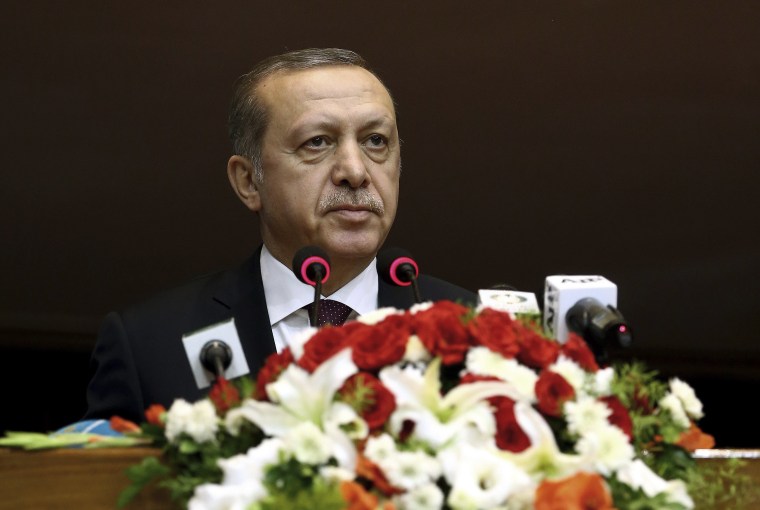 Image: Turkey's President Erdogan addresses the parliament in Pakistan, Thursday.