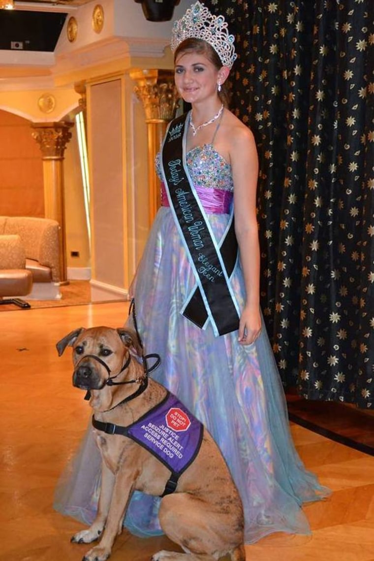 Jody Furrh with her seizure alert dog, Justice, at the Today's International Woman pageant.