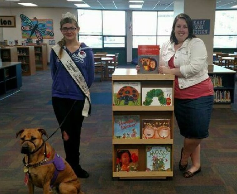 Jody wrote a book, "Justice, A Queen's Service Dog," as a way to explain the presence of her service dog to small children.
