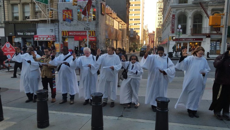 Interfaith leaders participate in the Jericho Walk around immigration services building in Federal Plaza.