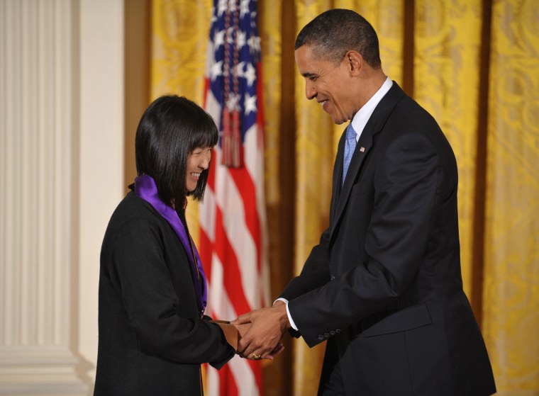 US President Barack Obama shakes hands w