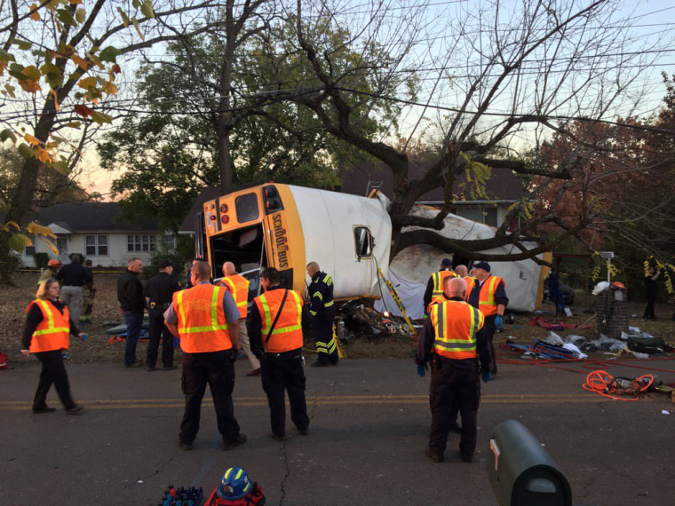 First responders tend to the scene of a school bus crash in Chattanooga, Tennessee, Nov. 21.
