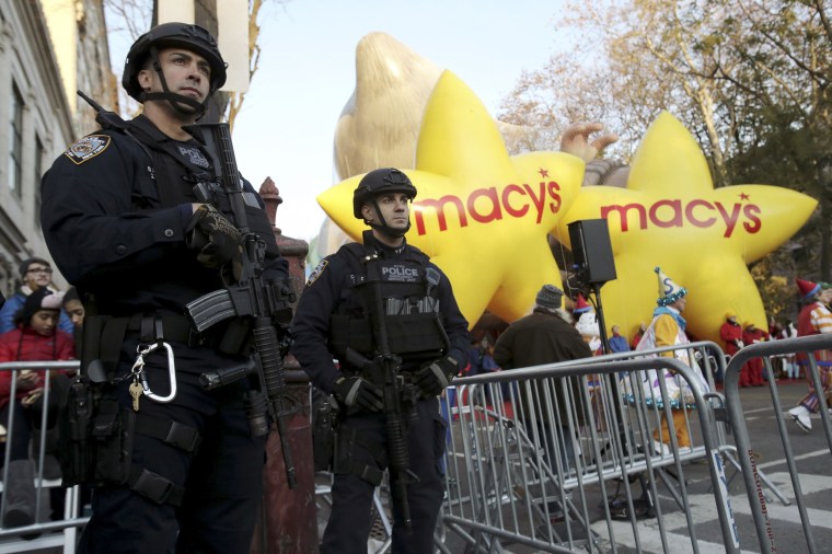 Image: File photo of members of the New York Police Department's Emergency Service Unit standing guard before the 89th Macy