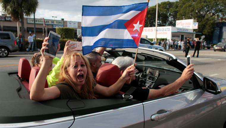 Image: People celebrate after the announcement of the death of Cuban revolutionary leader Fidel Castro, in the Little Havana district of Miami