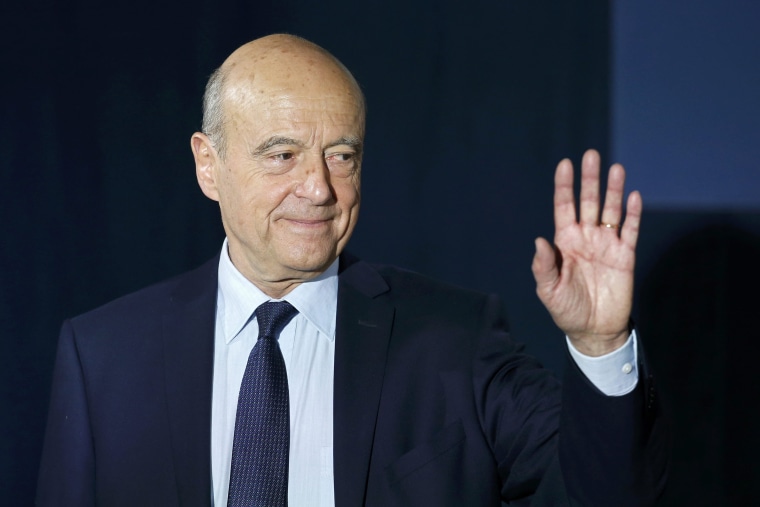 Image: Alain Juppe, current mayor of Bordeaux and member of the conservative Les Republicains political party, delivers his speech to recognise his defeat in the second round for the French center-right presidential primary election in Paris