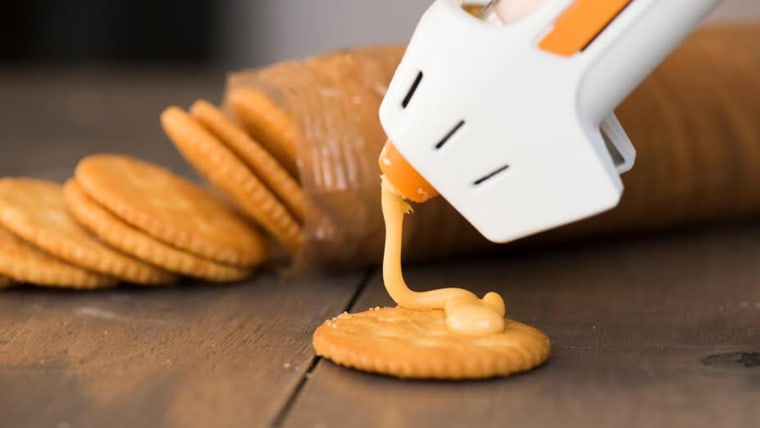 Have You Ever Wondered What Would Happen If You Put Cheese In A Hot Glue Gun?  [Video]