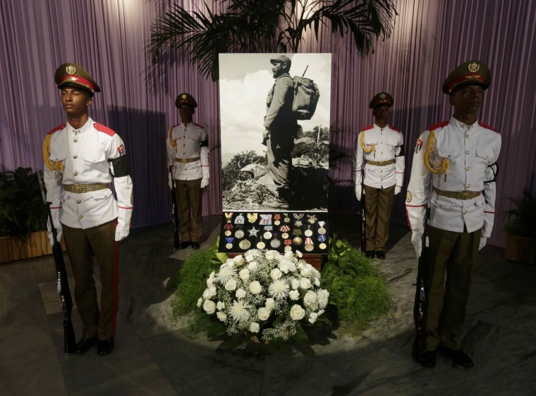 Image: A photograph of Cuba's late President Fidel Castro stands in tribute to him in Havana