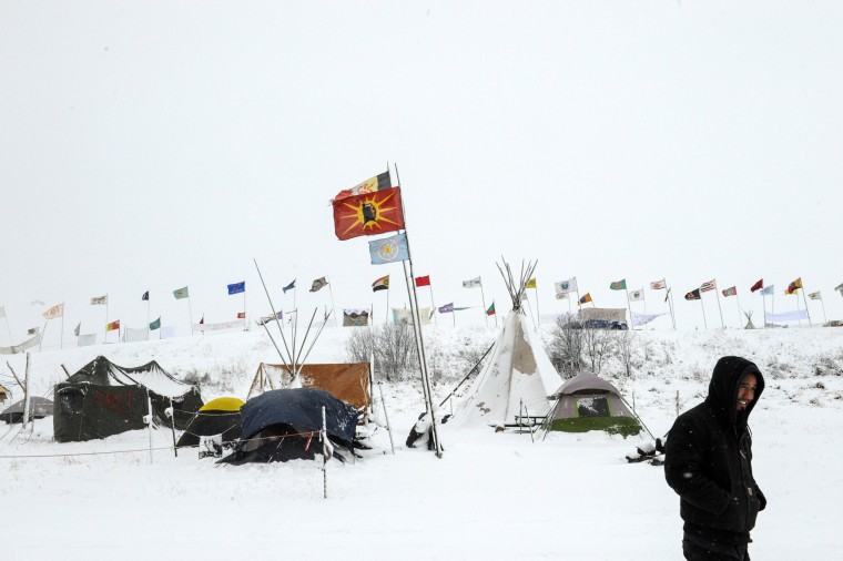 Image: The Oceti Sakowin camp is seen in a snow storm during a protest against plans to pass the Dakota Access pipeline near the Standing Rock Indian Reservation, near Cannon Ball, North Dakota, U.S