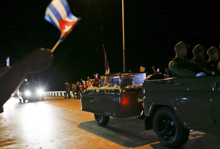 Image: The caravan carrying the ashes of Fidel Castro passes along a street in Ranchuelo