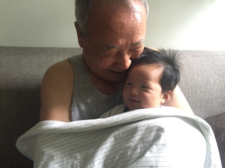 Ji Lee's father, Chanjae, with his son, Astro.