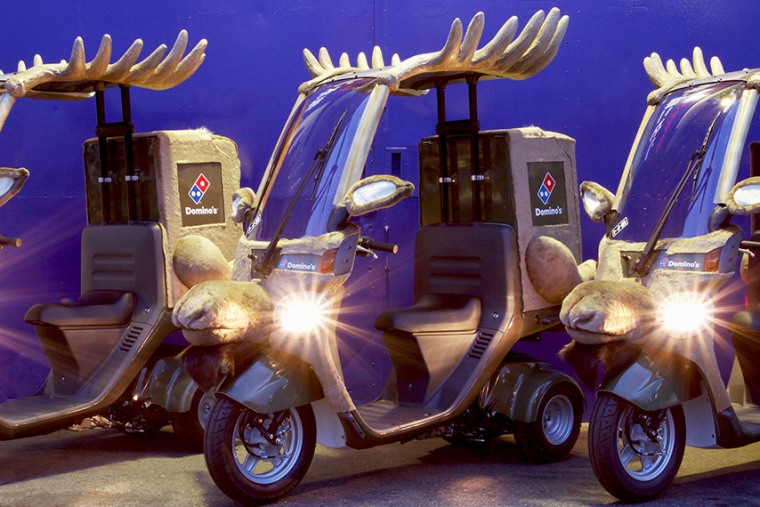 Dominos Japan introduces new reindeer-inspired delivery cars to replace reindeer delivery program