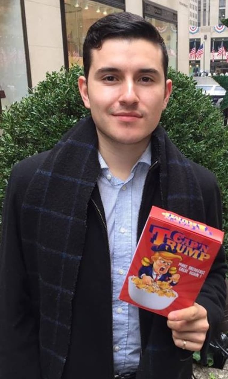 Martin Zara holding his "Cap'n Crunch" satire cereal art.