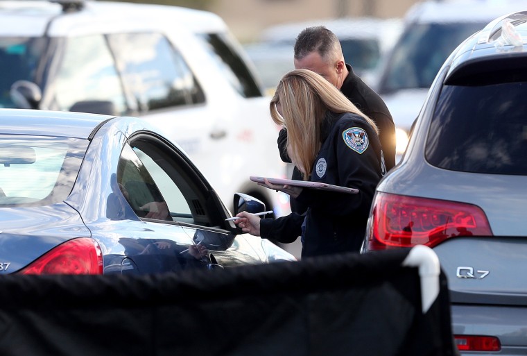 Crime scene technicians gather evidence  as the Jefferson Parish Sheriff's Office investigates the homicide of former NFL player Joe McKnight at Behrman Highway and Holmes Blvd. in Terrytown on Thursday, Dec. 2.