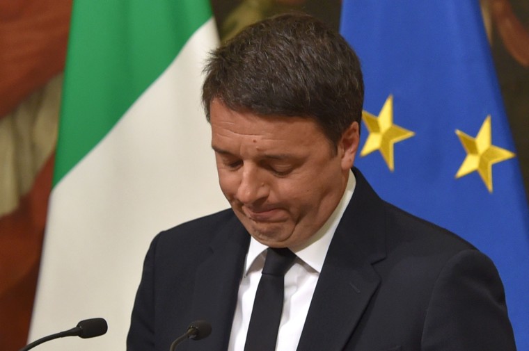 IMAGE: Italian Prime Minister Matteo Renzi resigns