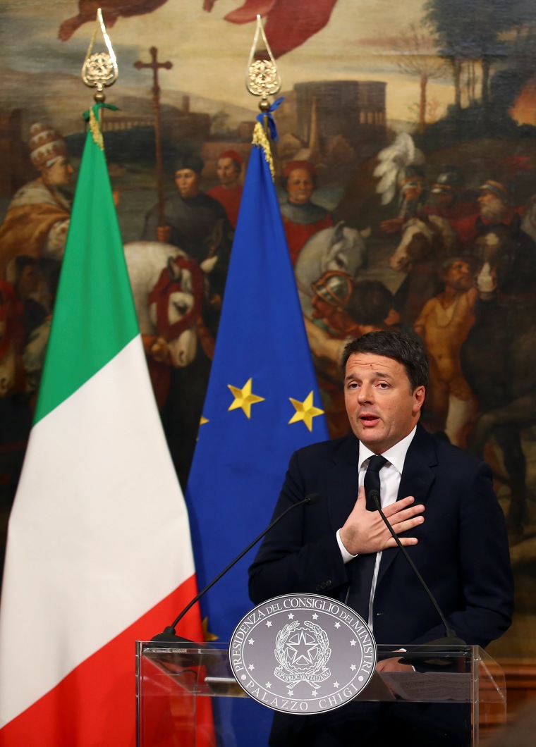 IMAGE: Italian Prime Minister Matteo Renzi resigns