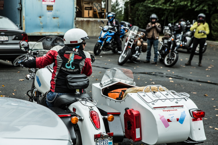 A biker is ready to hit the road with a "trunk" full of breast milk.