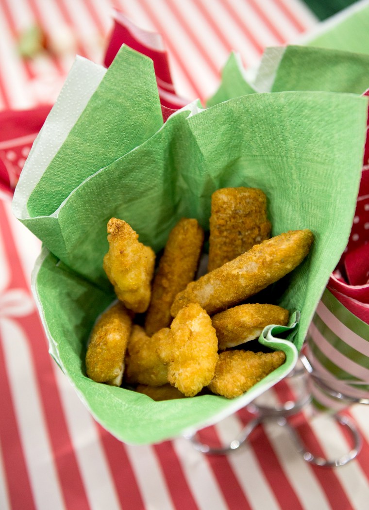 Holiday party hacks: Serve appetizers for kids in party hats