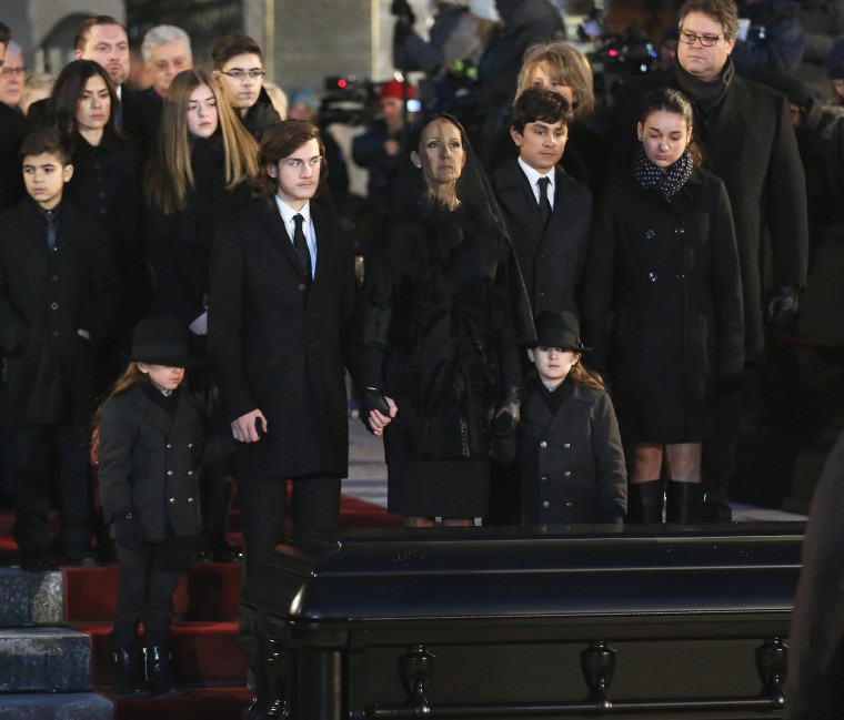 Celine Dion and children Rene-Charles Angelil, Eddy Angelil and Nelson Angelil attend the State Funeral Service for Celine Dion's Husband Rene Angelil at Notre-Dame Basilica on January 22, 2016 in Montreal, Canada.